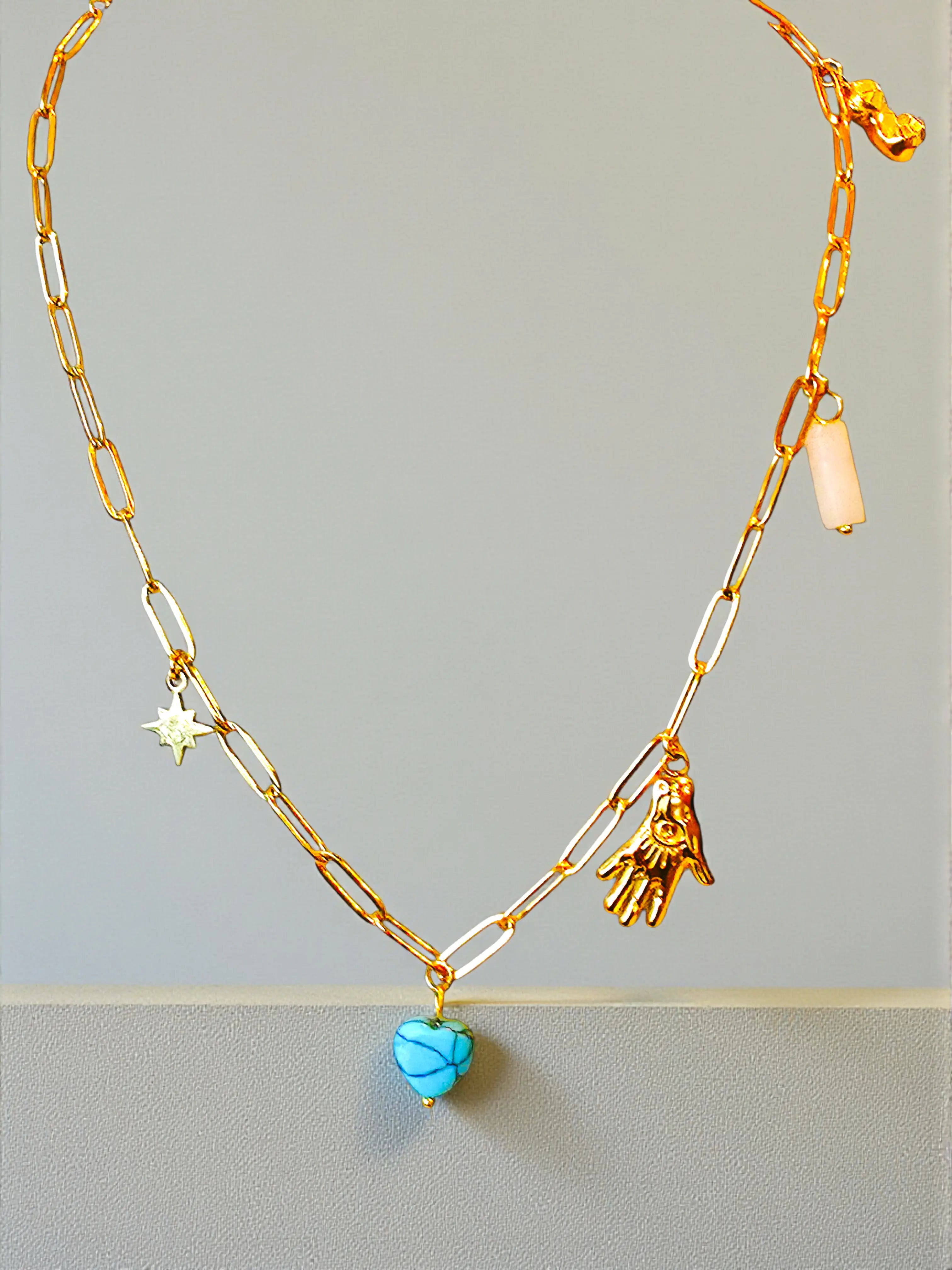 Auralis Charm Cascade Necklace Gold Charm Necklace with Turquoise Heart and Amulets