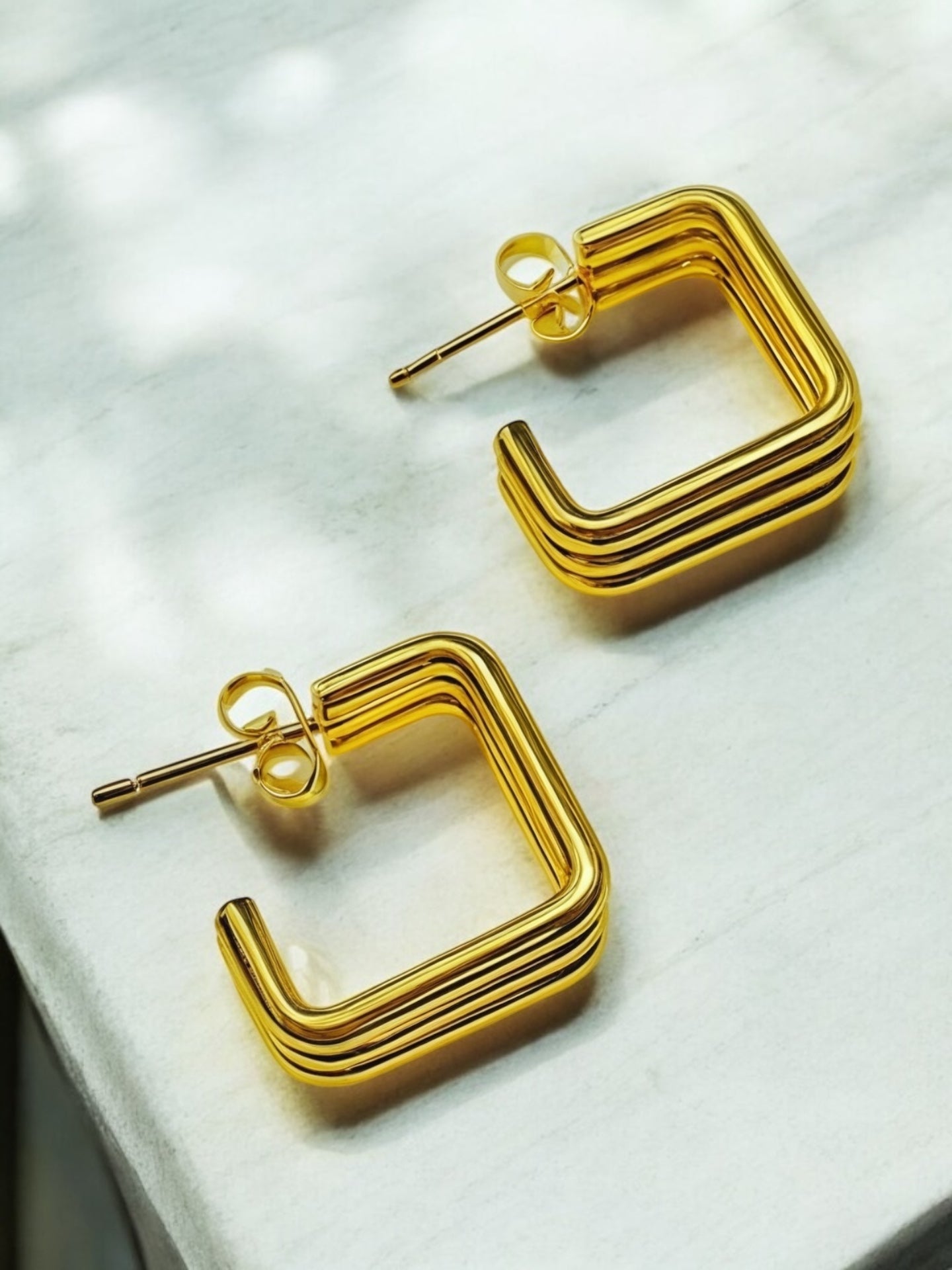 Quadora Earrings